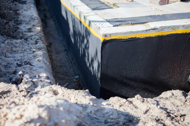 Professional Basement Waterproofing technician working in Galena, KS